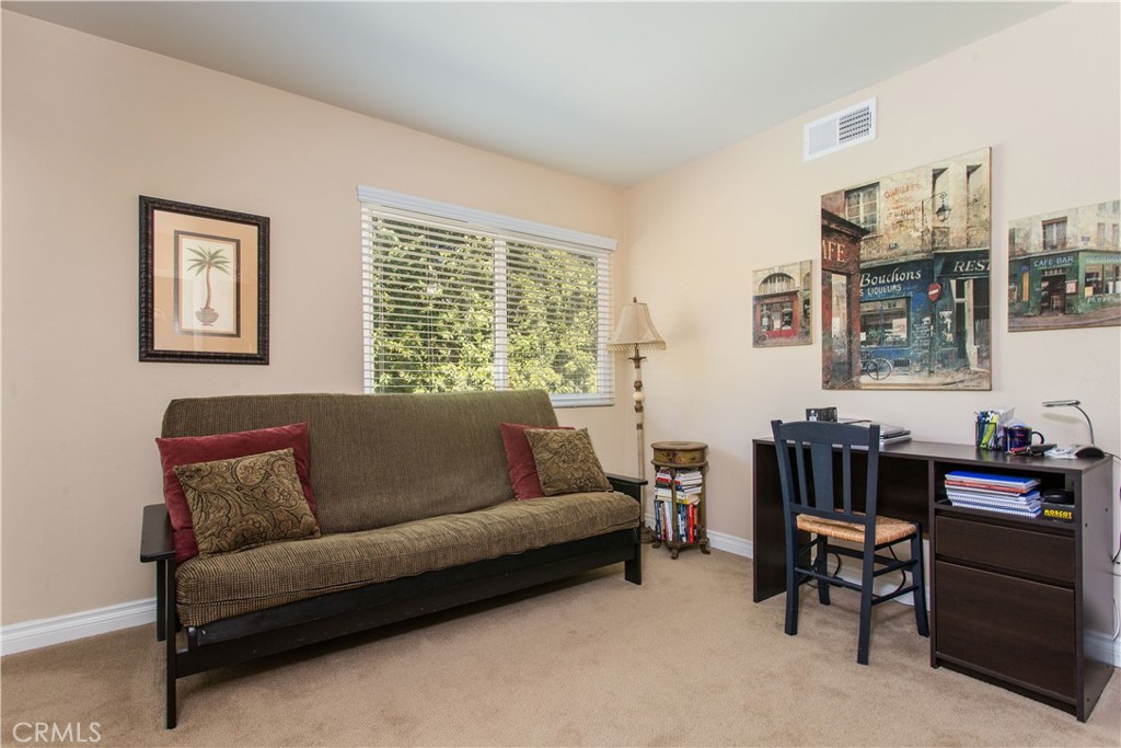 30311 Goodspring Drive Agoura Hills, CA 91301 - Photo 14 of 18 a living room with furniture and a window