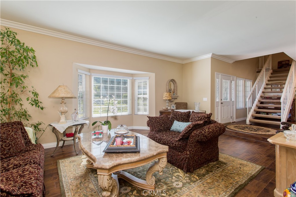 30311 Goodspring Drive Agoura Hills, CA 91301 - Photo 2 of 18 a living room with furniture and a large window