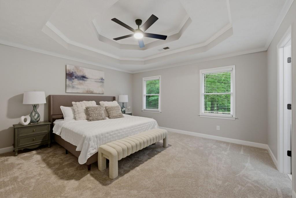 542 Knox Chapel Road Social Circle, GA 30025 - Photo 9 of 52 a bedroom with a large bed and a window