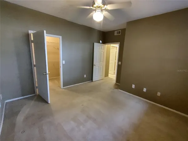 a view of a room with racks on the wall