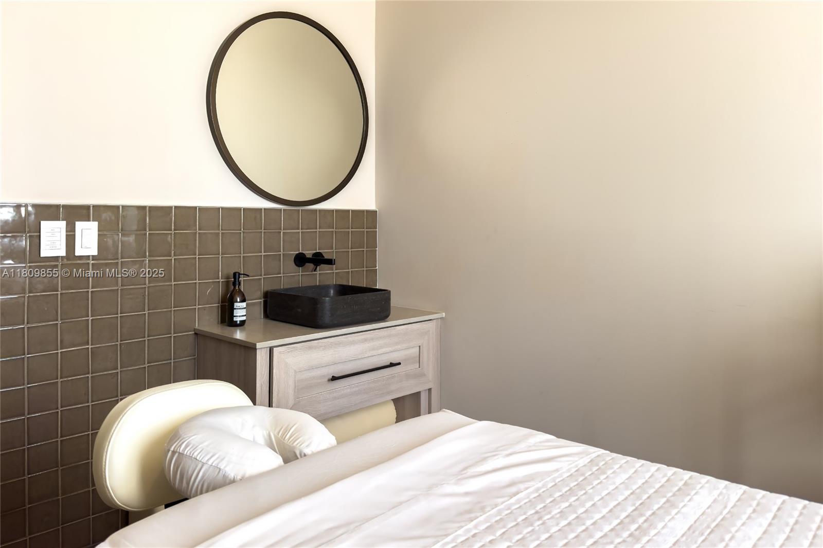 159 Northeast 6th Street, Unit 3012 Miami, FL 33132 - Photo 70 of 91 a bathroom with a sink a mirror and a window