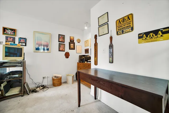 a view of a livingroom with furniture and cabinet