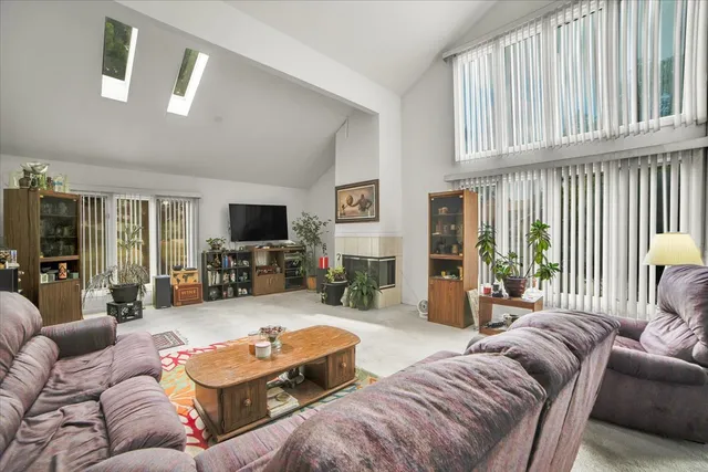 a living room with furniture or couch and a flat screen tv