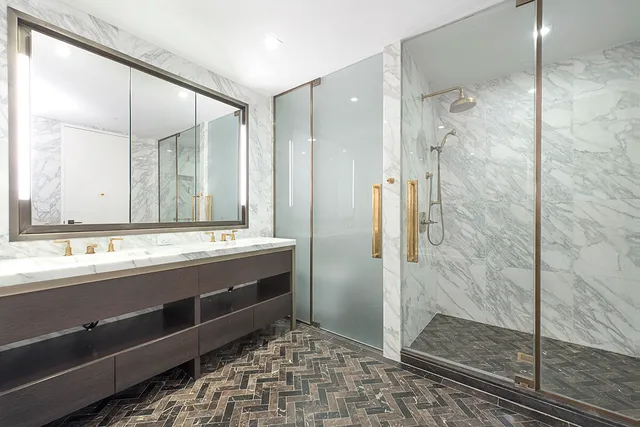 a bathroom with a bathtub and a sink