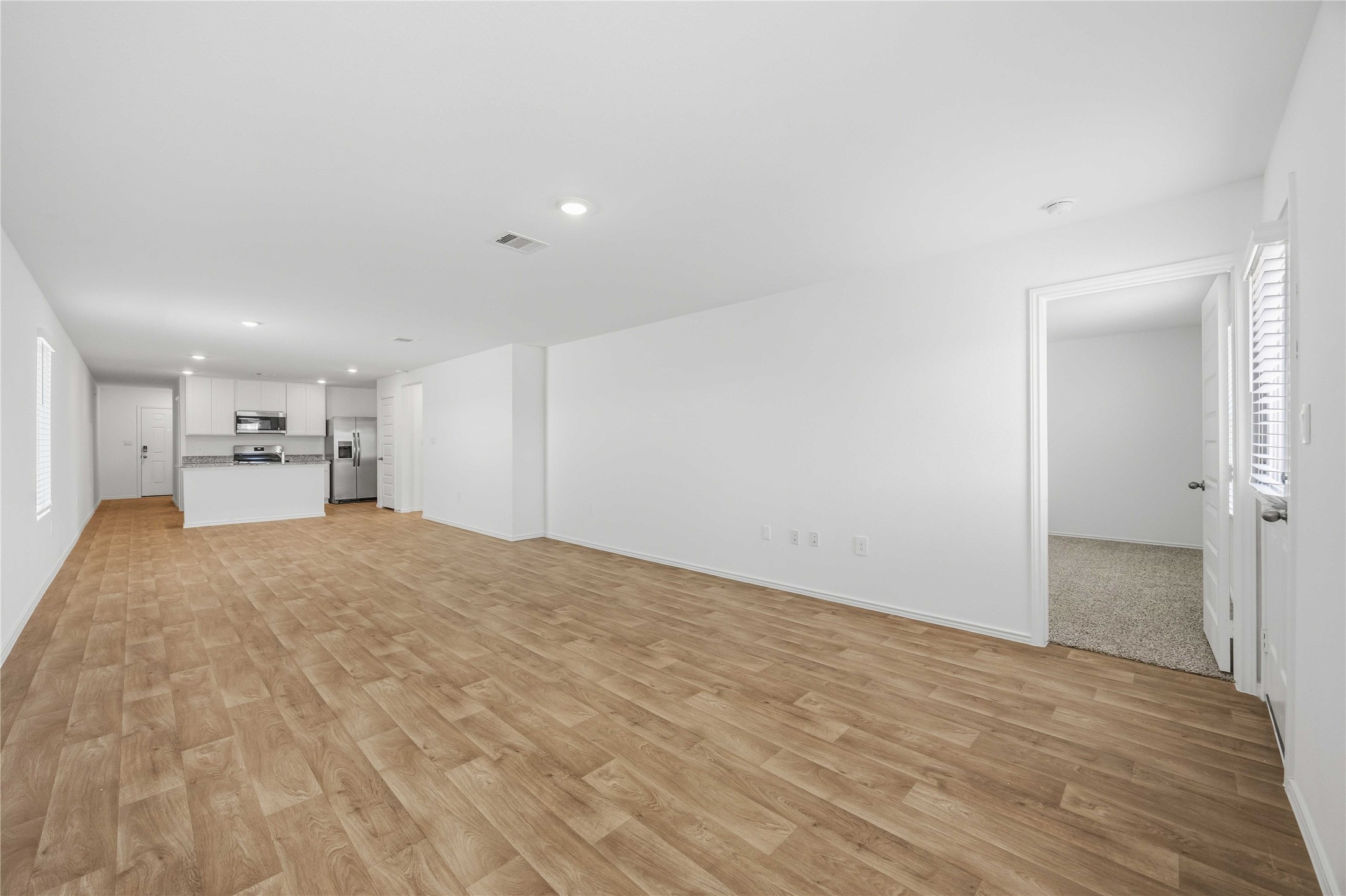 11913 Sweet Apple Lane Houston, TX 77048 - Photo 9 of 20 a view of empty room with wooden floor