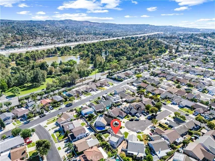 a picture of a bathroom with a shower and a mirror