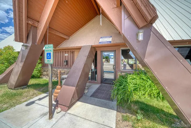a view of a chairs and table in a patio