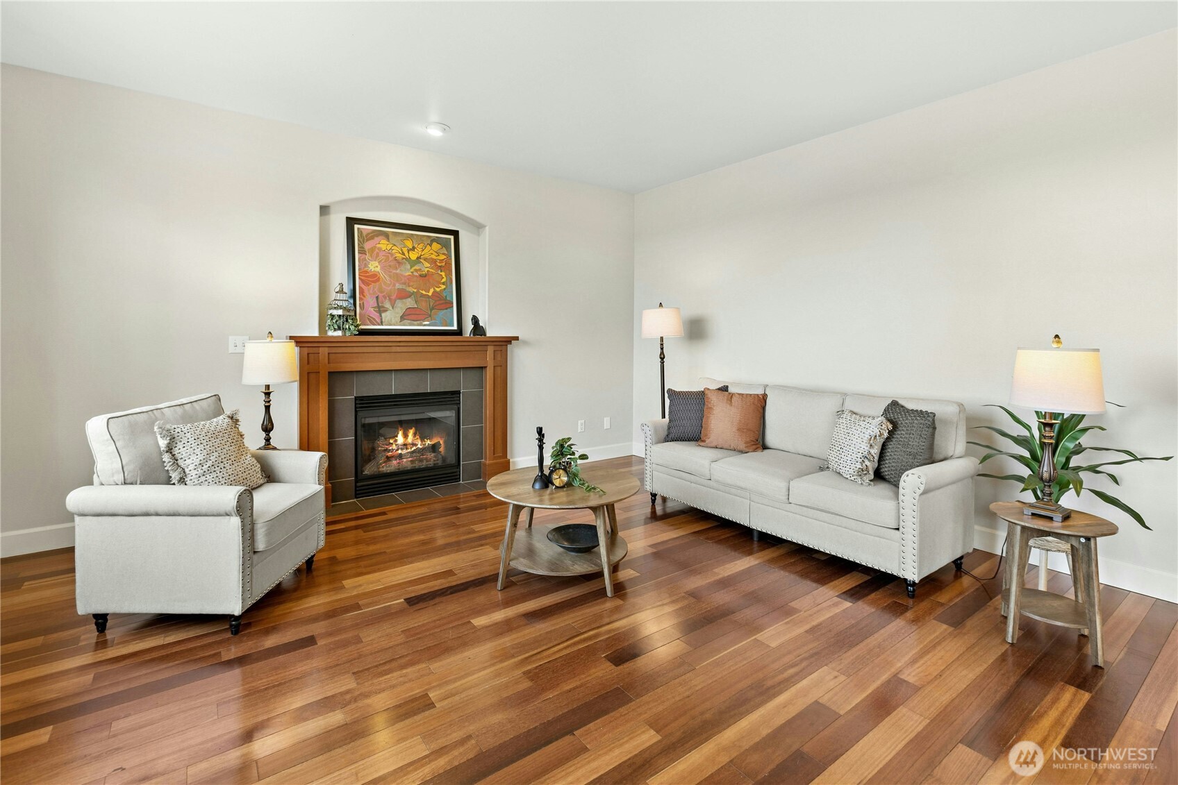 22624 43rd Drive Southeast Bothell, WA 98021 - Photo 12 of 36 a living room with furniture and a fireplace