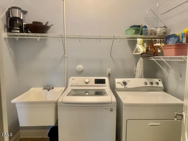 a utility room with dryer and washer
