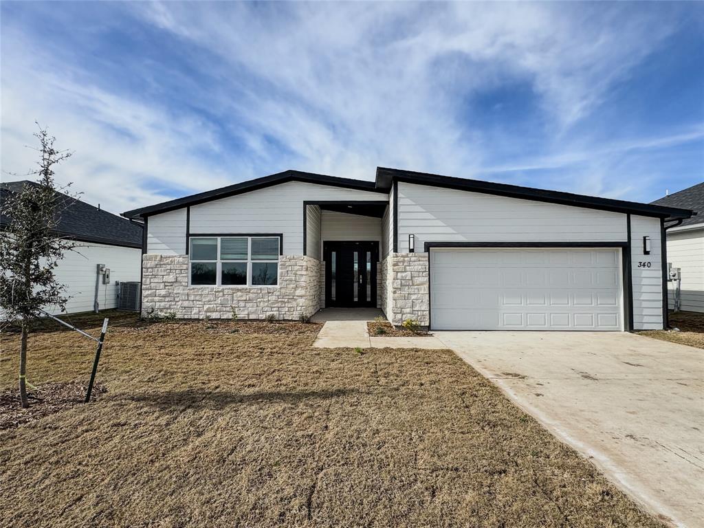 340 Lucy Road Greenville, TX 75402 - Photo 1 of 19 a house with yard in front of it