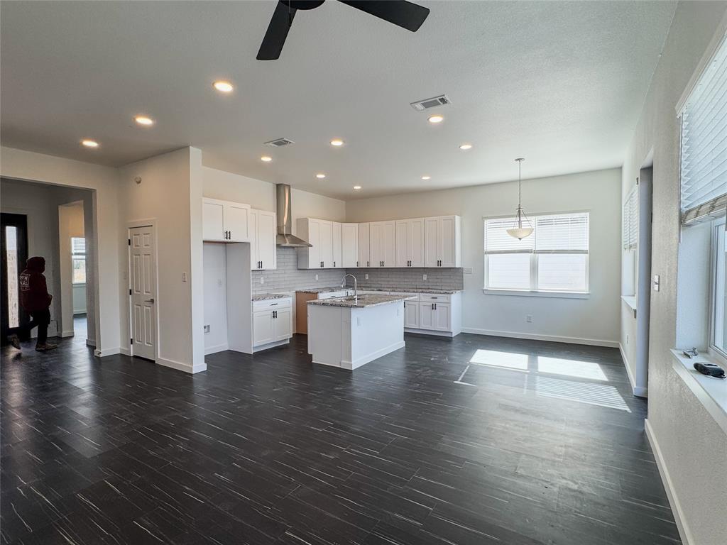 340 Lucy Road Greenville, TX 75402 - Photo 5 of 19 a view of a kitchen with refrigerator and window