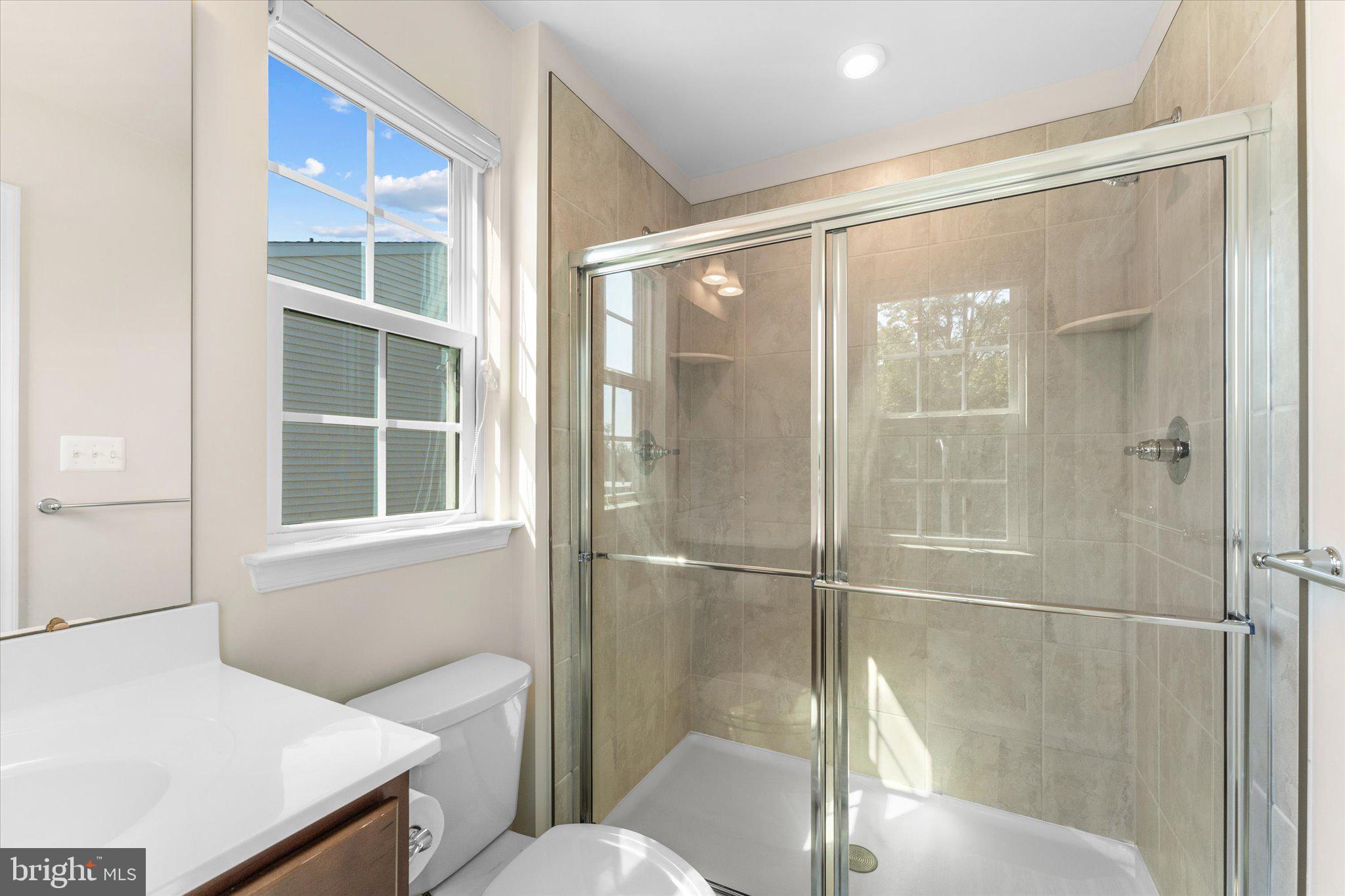 1776 Scenic Loop Culpeper, VA 22701 - Photo 23 of 36 a bathroom with a bathtub and a shower