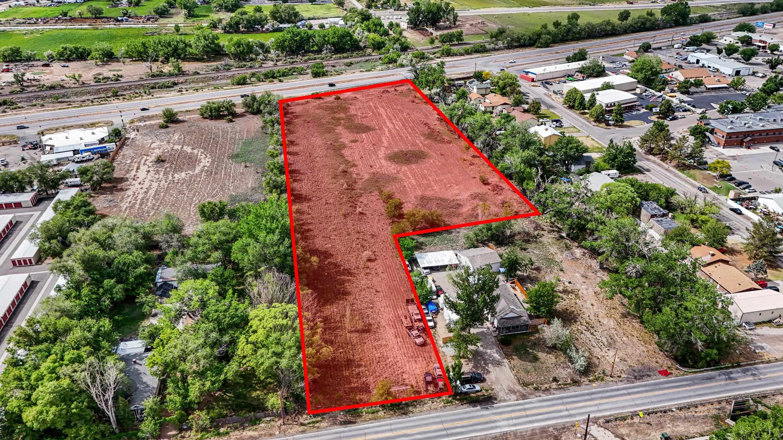 an aerial view of house with yard