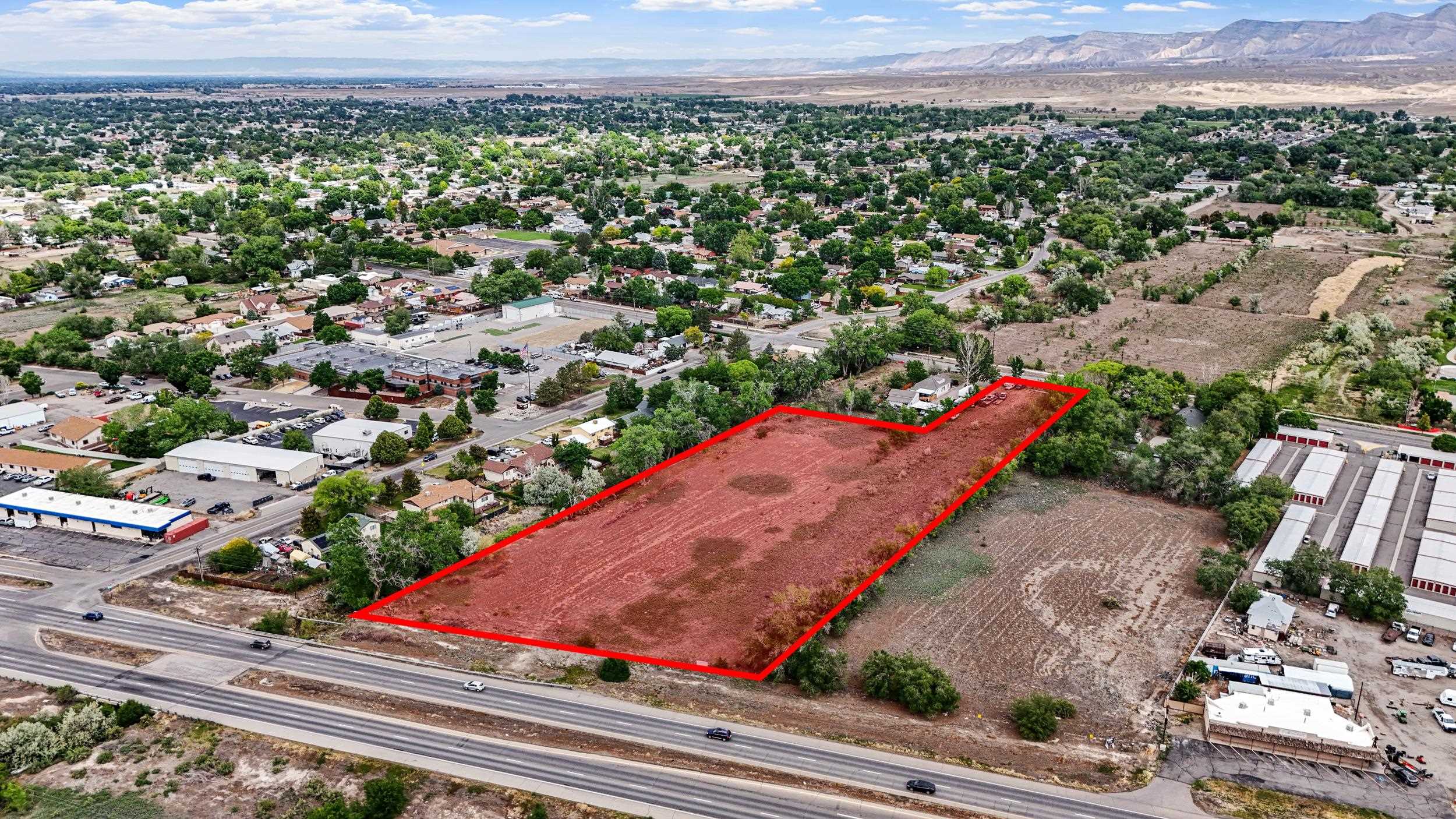 3105 East 1/2 Road Grand Junction, CO 81504 - Photo 3 of 6 an aerial view of a residential houses with street