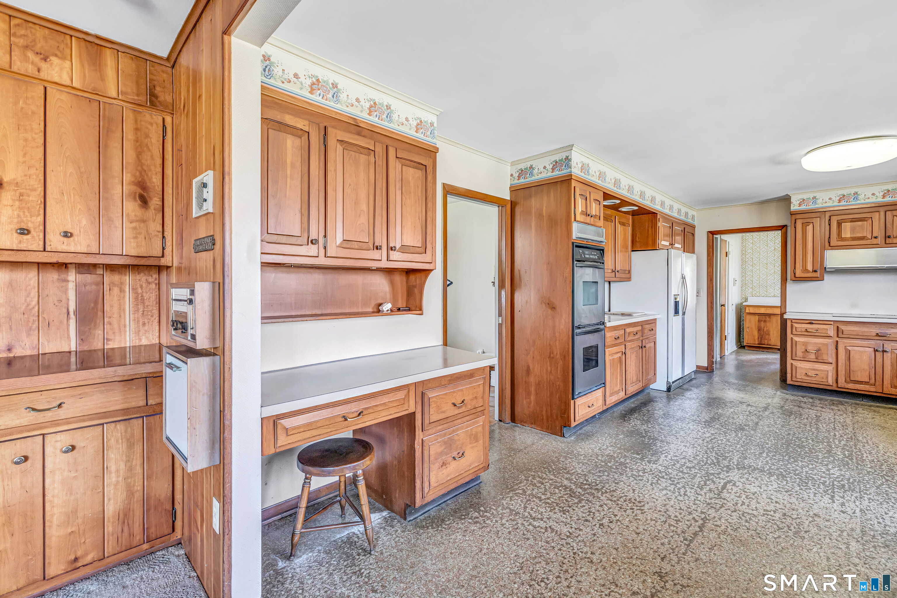 160 Sport Hill Road Easton, CT 06612 - Photo 15 of 40 a view of a kitchen with furniture and an empty room