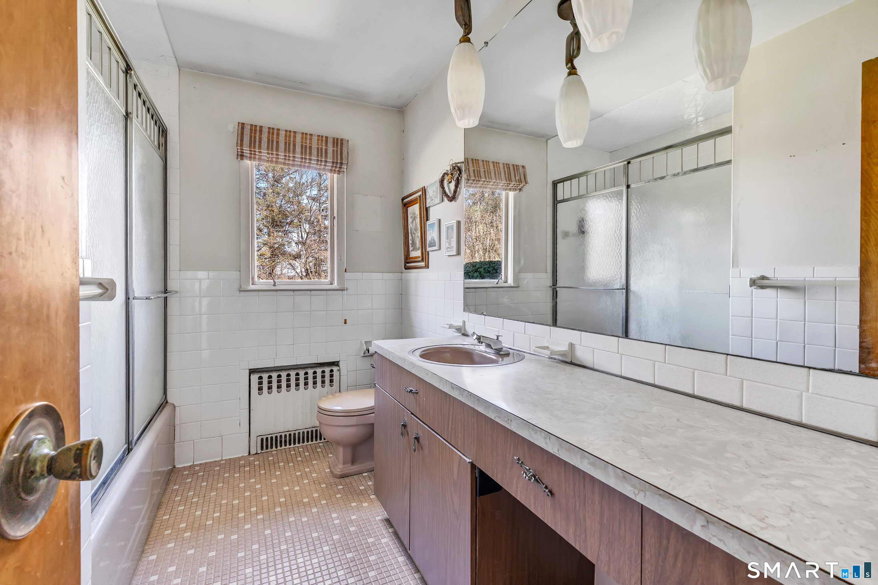 160 Sport Hill Road Easton, CT 06612 - Photo 30 of 40 a spacious bathroom with a granite countertop sink a toilet a mirror and shower