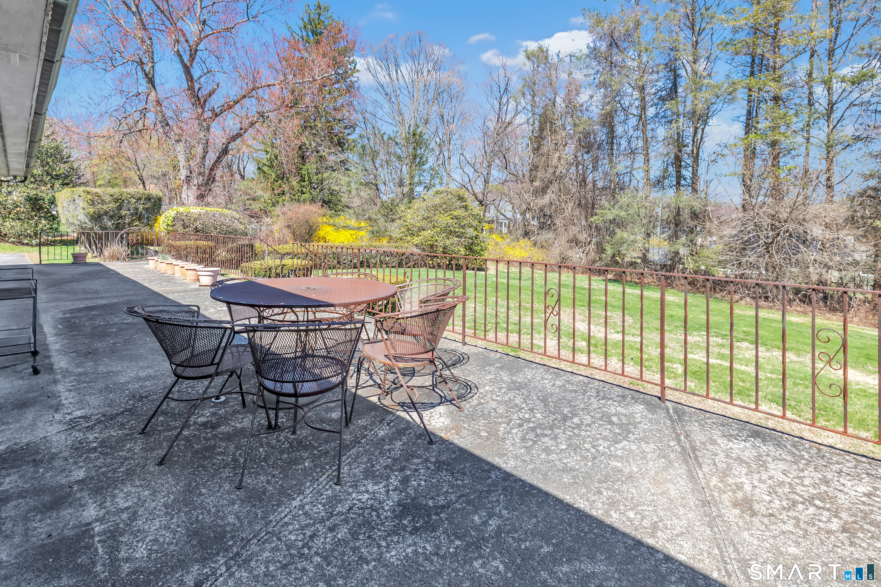 160 Sport Hill Road Easton, CT 06612 - Photo 37 of 40 a view of a backyard with a table and chairs