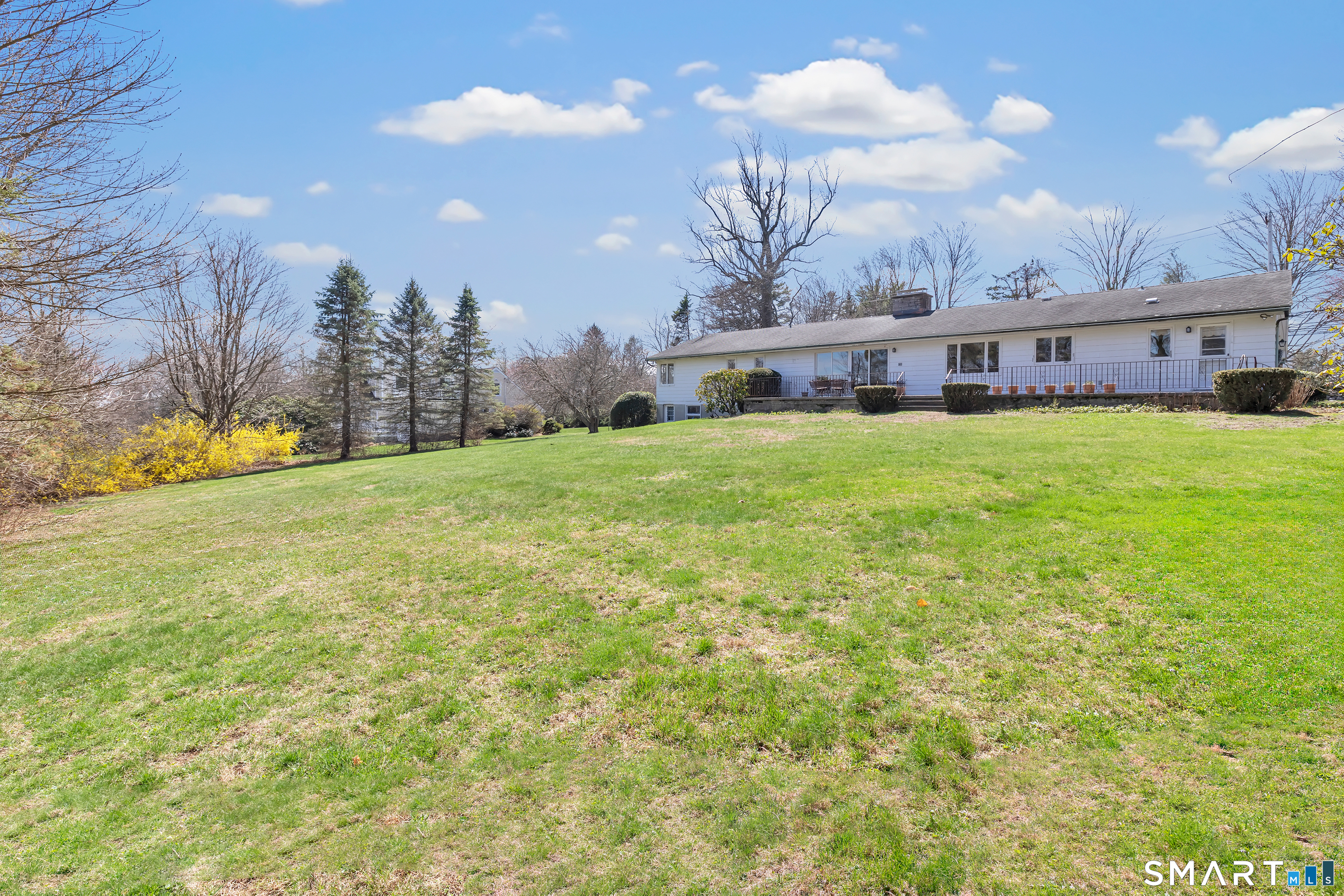 160 Sport Hill Road Easton, CT 06612 - Photo 38 of 40 a view of a house with a big yard and large trees