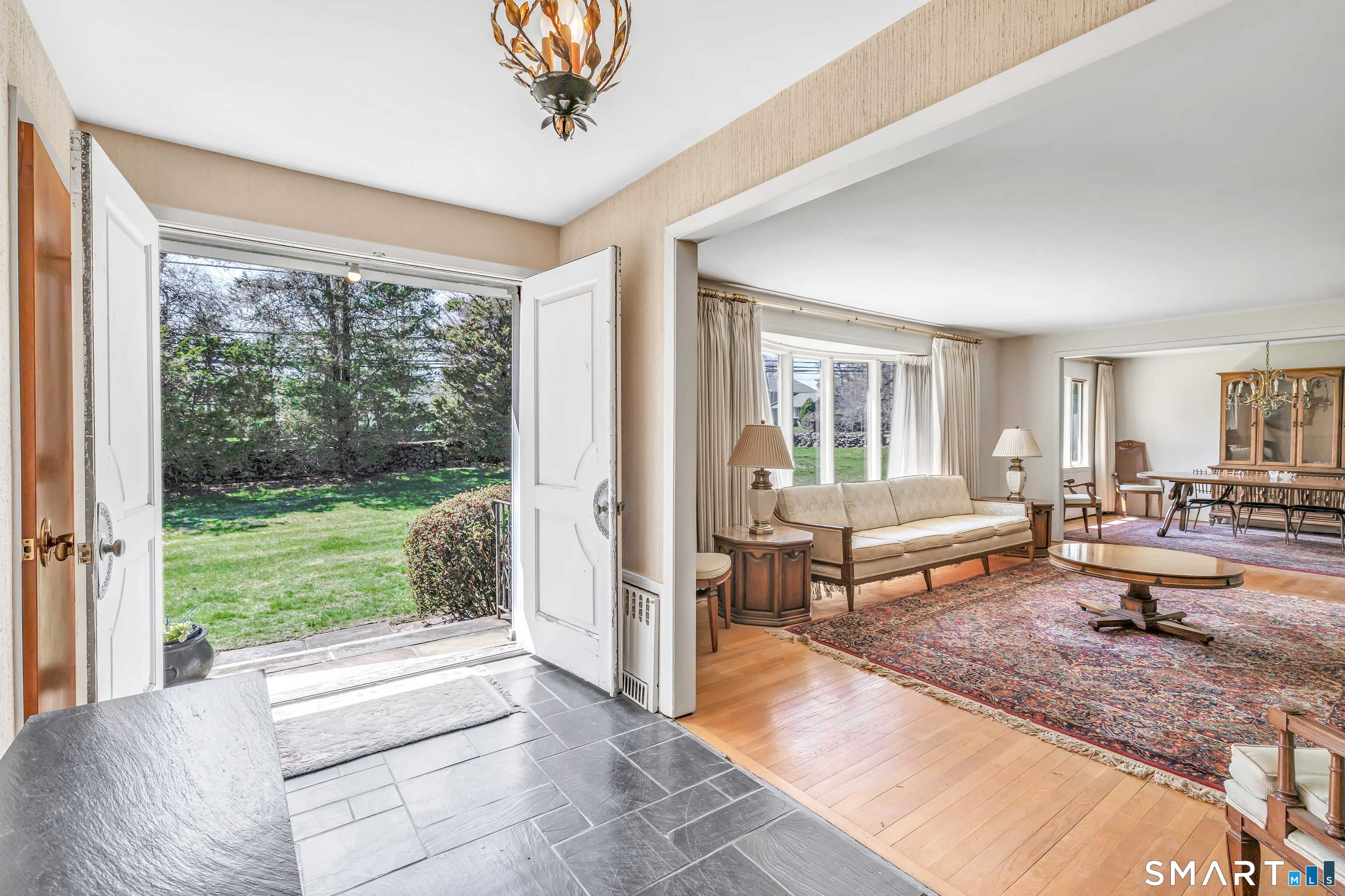 160 Sport Hill Road Easton, CT 06612 - Photo 5 of 40 a living room with furniture and a large window