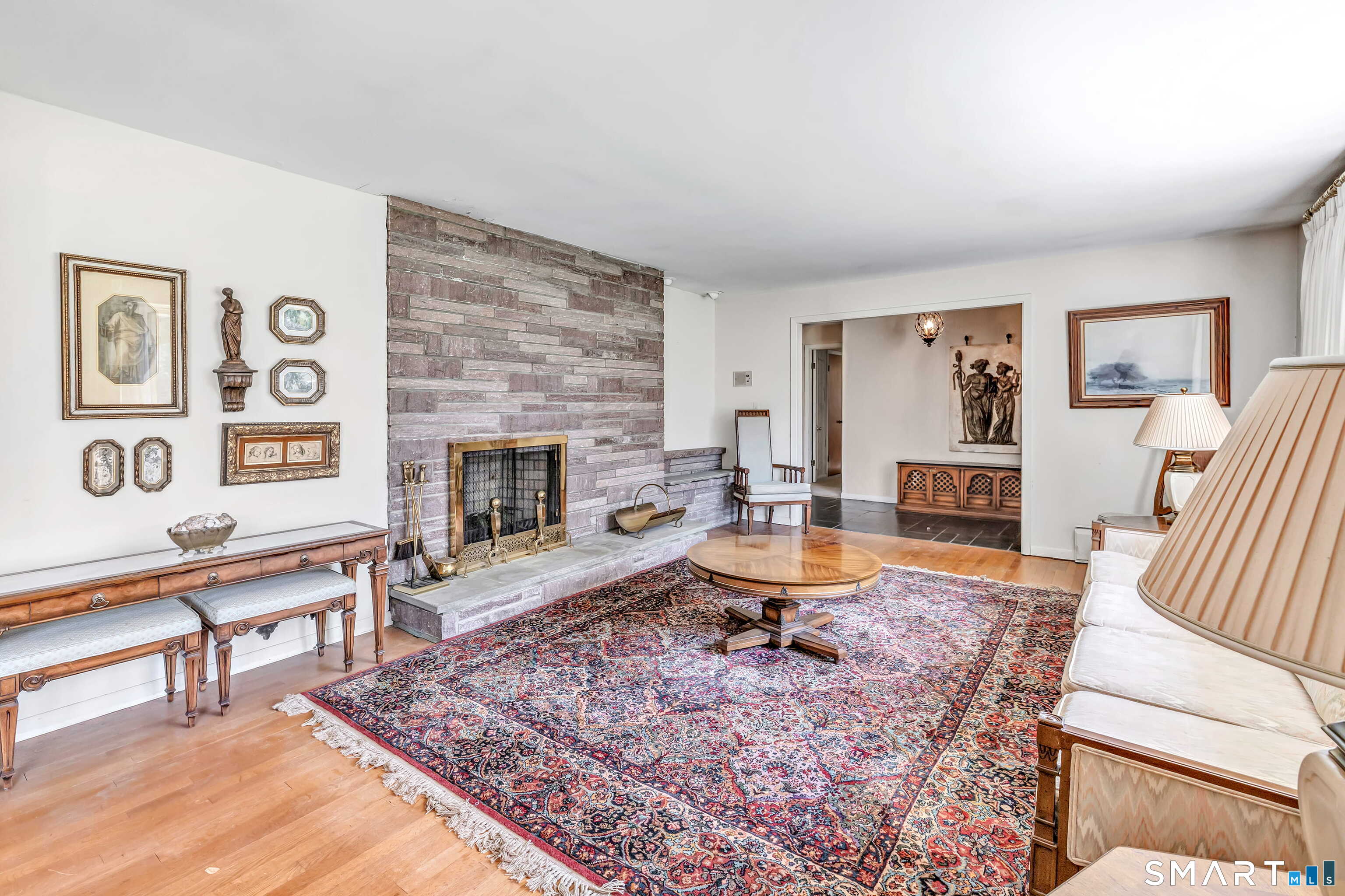 160 Sport Hill Road Easton, CT 06612 - Photo 8 of 40 a living room with furniture and a fireplace