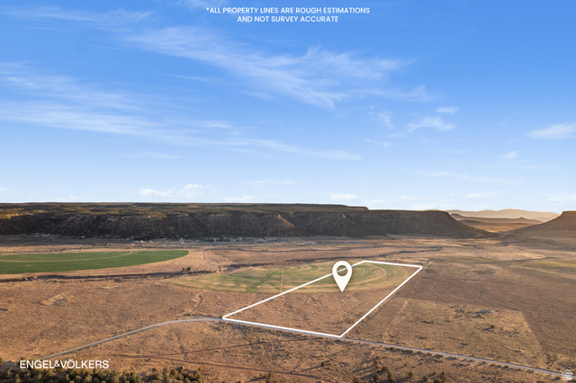 Gooseberry Way Apple Valley, UT 84737 - Photo 8 of 24 Expansive land parcel with surrounding rugged terrain and distant mesas