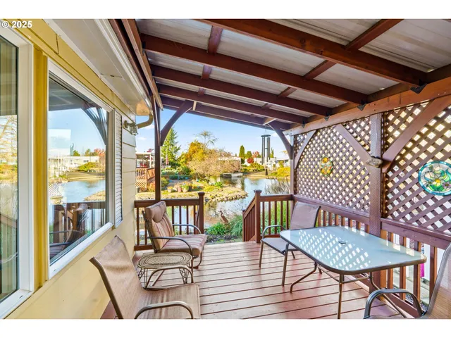 a view of a balcony with furniture