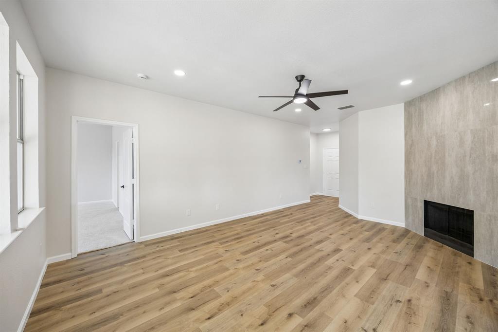 13347 Dove Ranch Road Fort Worth, TX 76262 - Photo 7 of 30 Wood-finish flooring, recessed lighting, and a modern ceiling fan