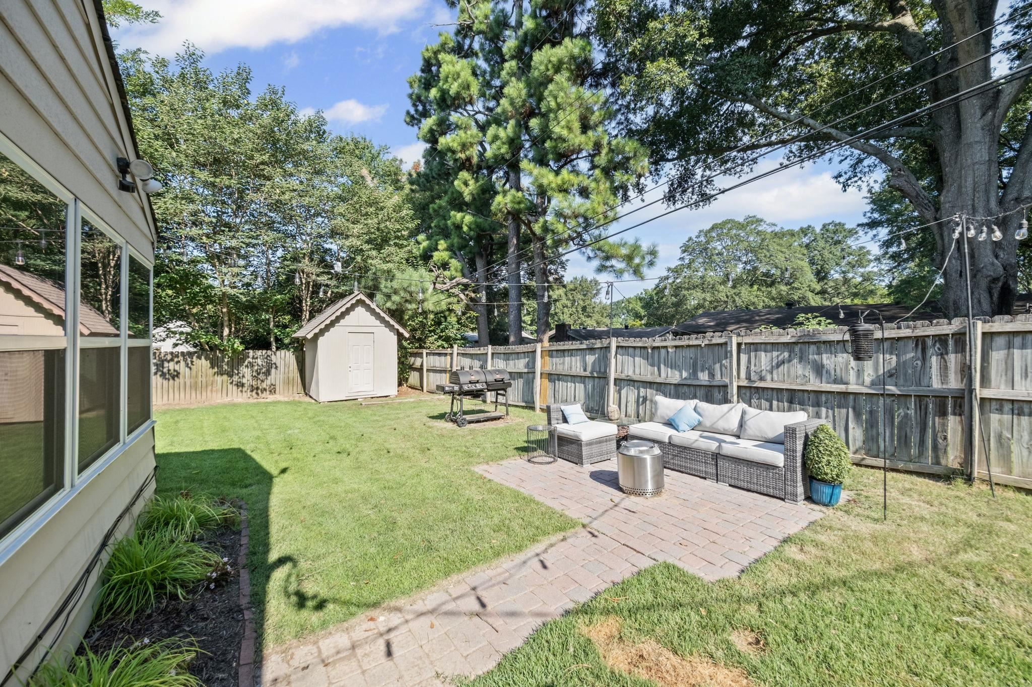 446 Rosser Road Memphis, TN 38120 - Photo 27 of 30 a view of a backyard with sitting area