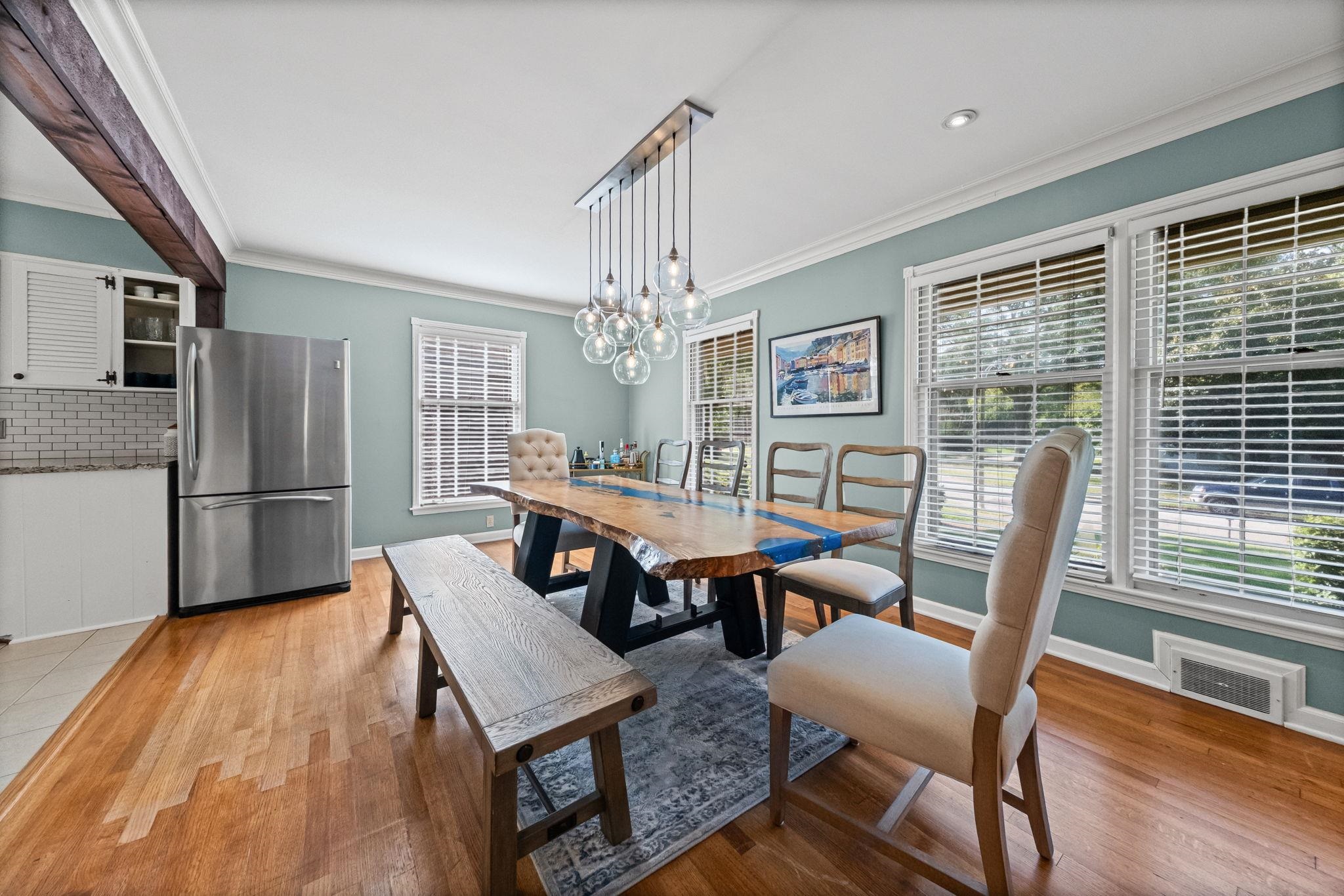 446 Rosser Road Memphis, TN 38120 - Photo 3 of 30 a view of a dining room with furniture window and wooden floor