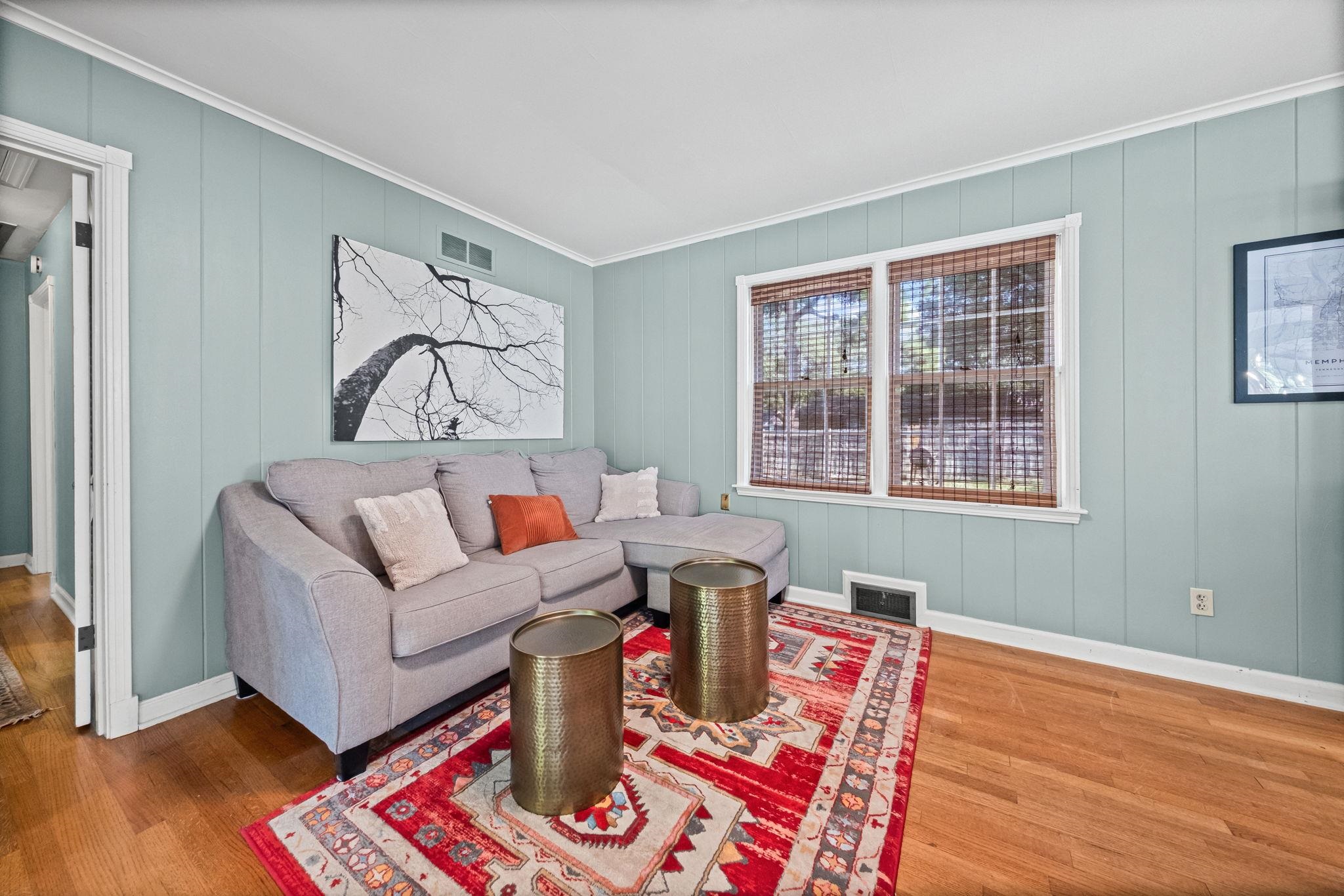 446 Rosser Road Memphis, TN 38120 - Photo 4 of 30 a living room with furniture and a wooden floor