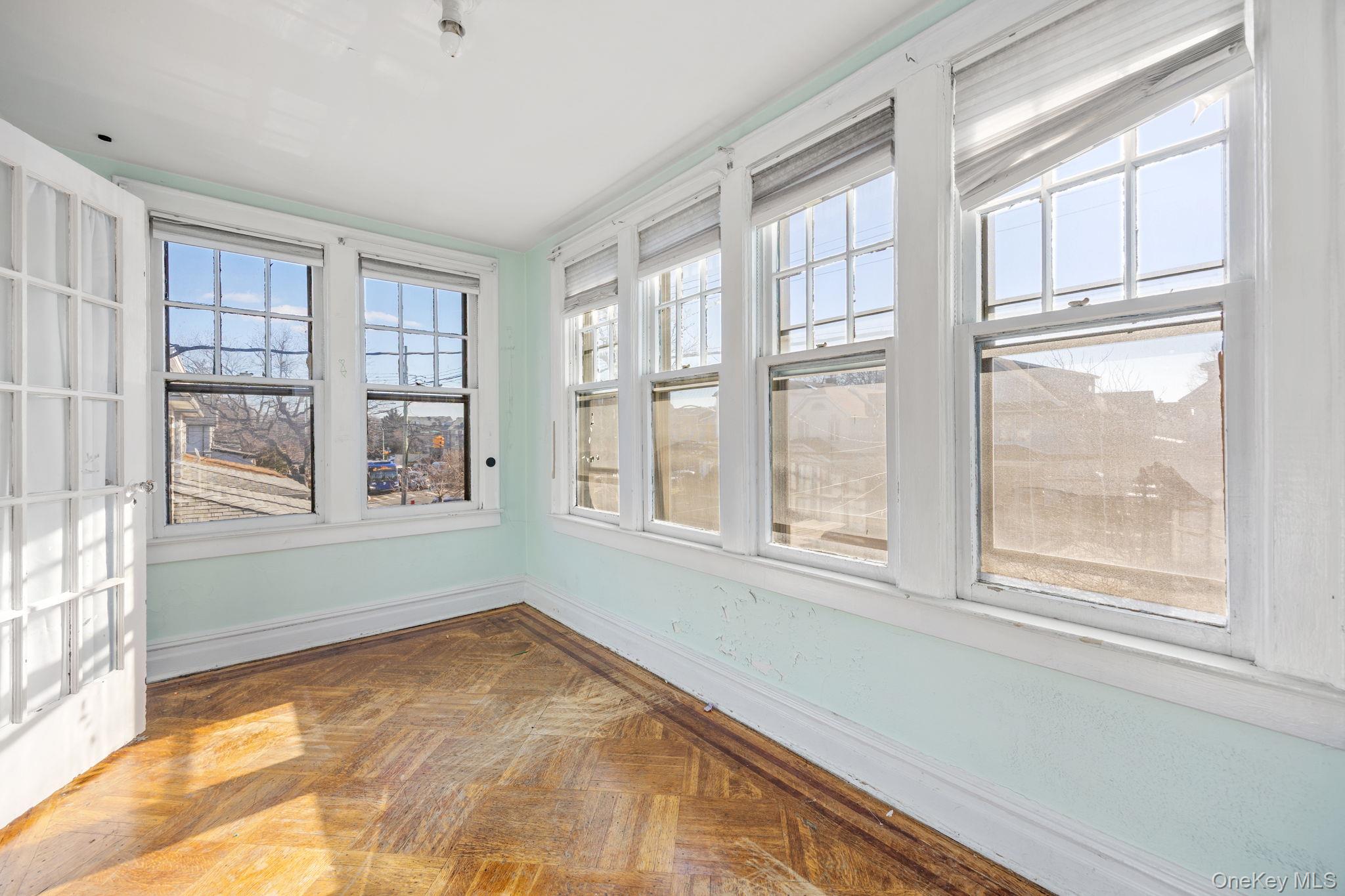 2109 Avenue R Brooklyn, NY 11229 - Photo 19 of 24 a view of an empty room with a window