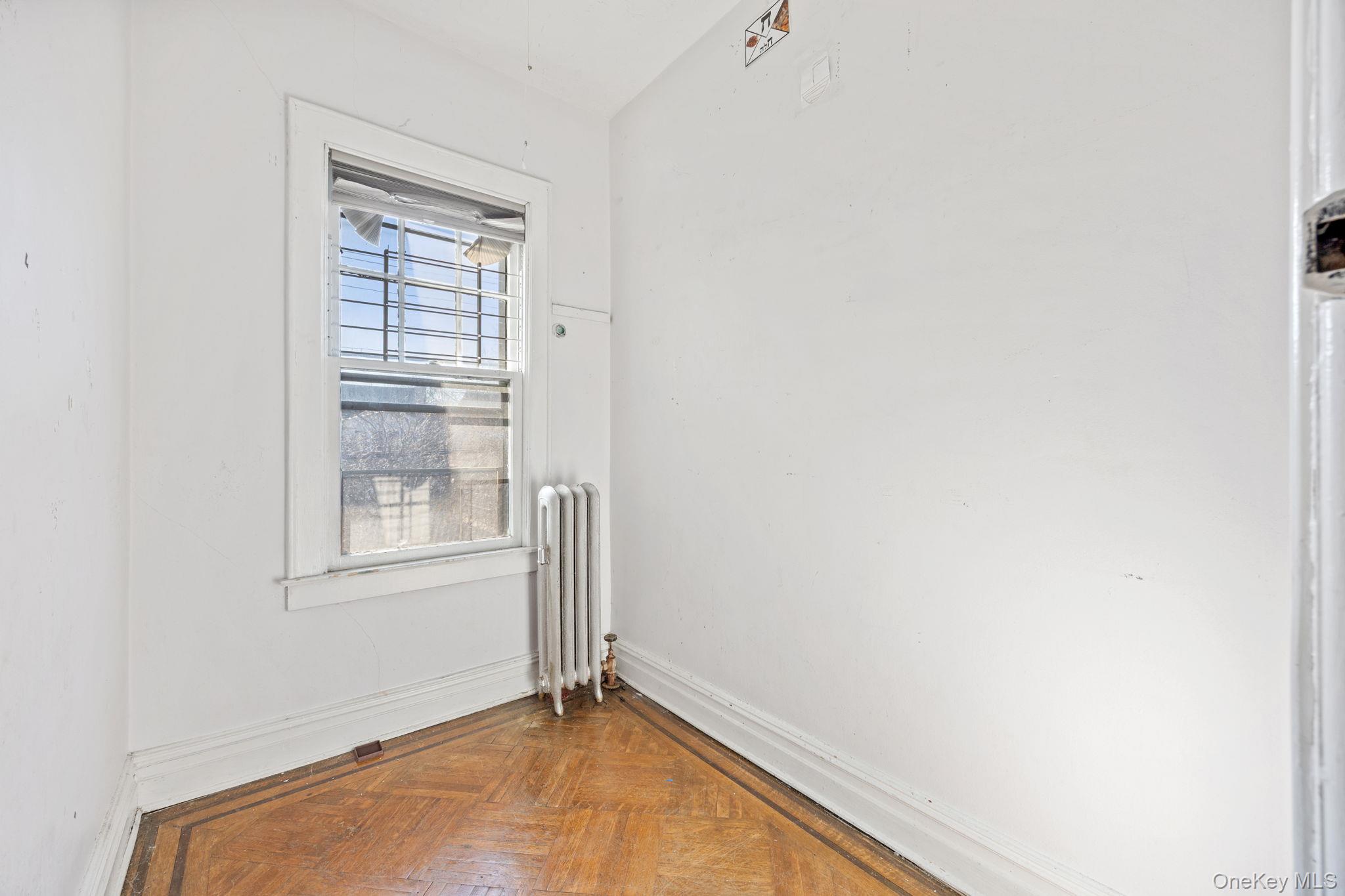 2109 Avenue R Brooklyn, NY 11229 - Photo 20 of 24 a view of empty room with window