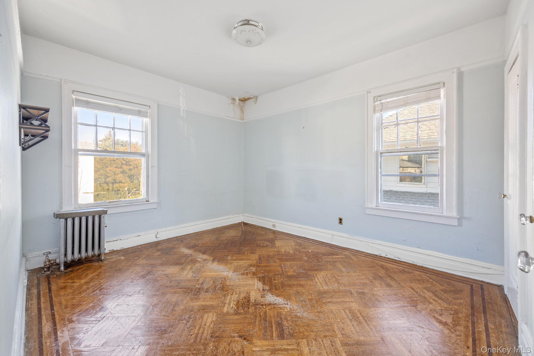 2109 Avenue R Brooklyn, NY 11229 - Photo 21 of 24 a view of an empty room with a window