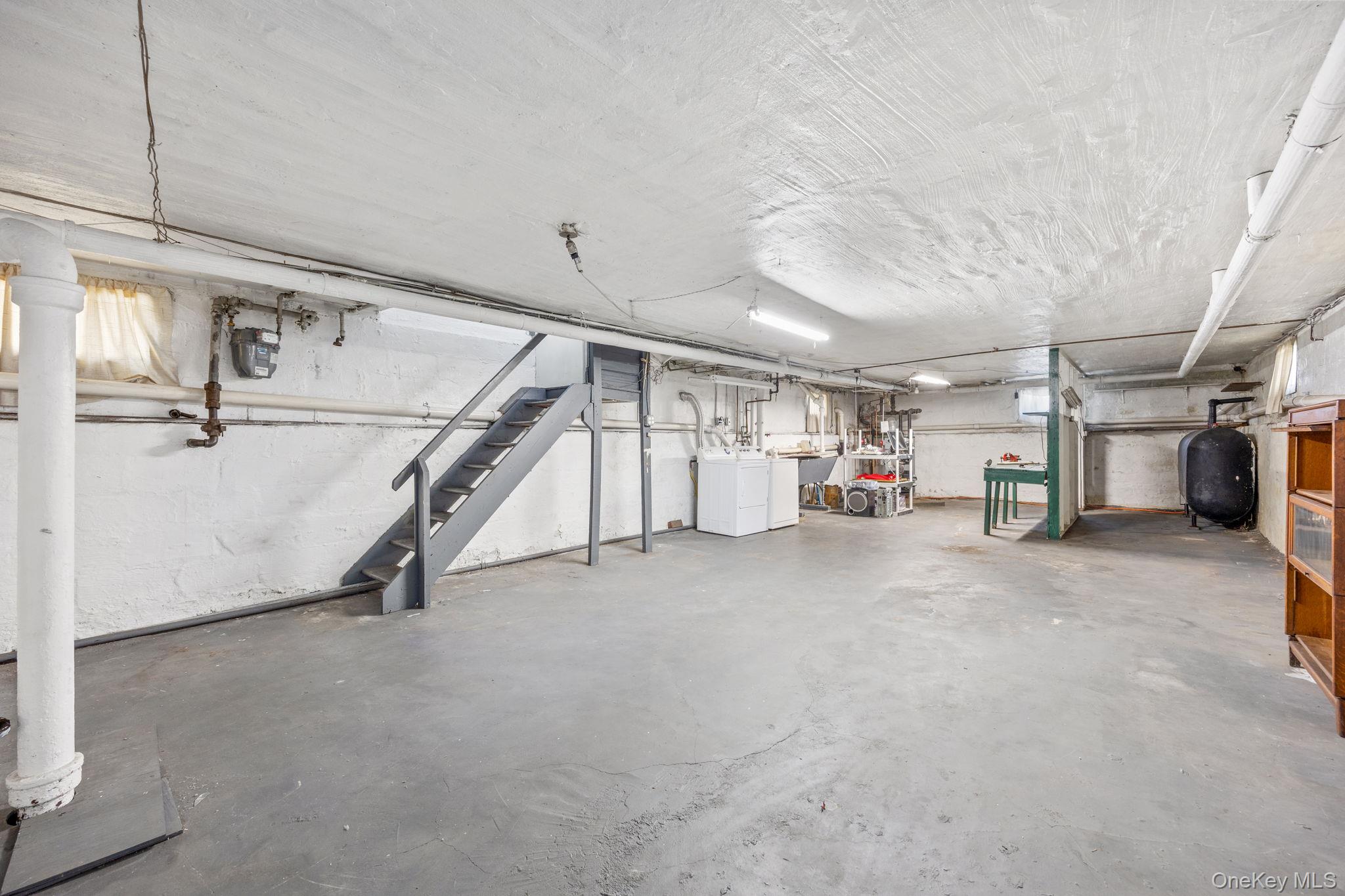2109 Avenue R Brooklyn, NY 11229 - Photo 22 of 24 a view of a storage & utility room with stairs