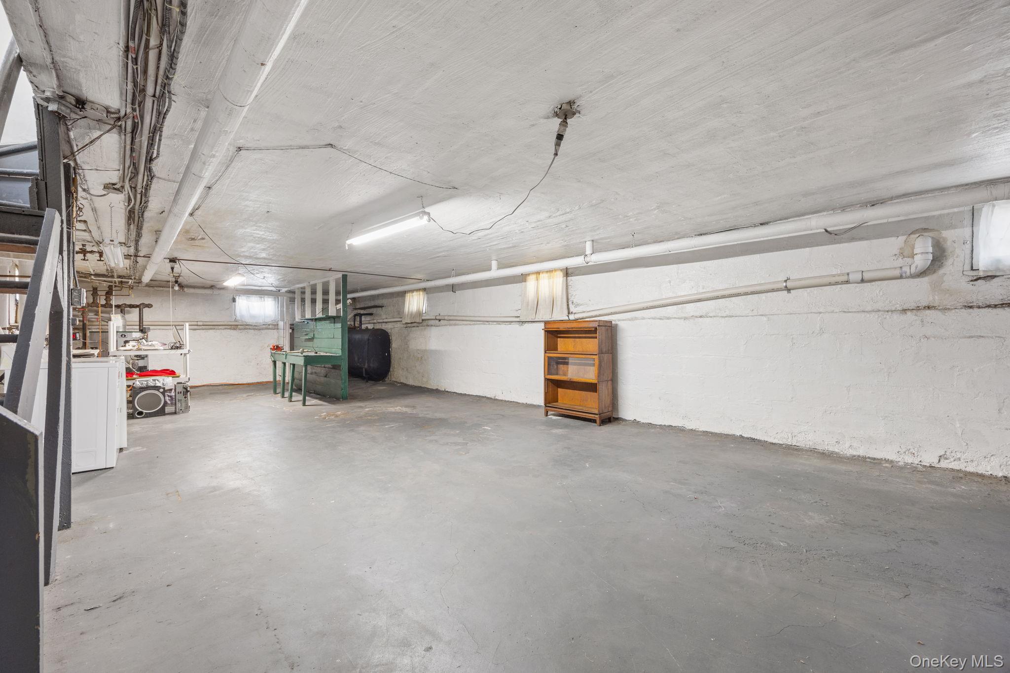 2109 Avenue R Brooklyn, NY 11229 - Photo 23 of 24 a view of empty room with wooden floor
