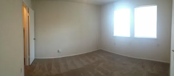an empty room with a window