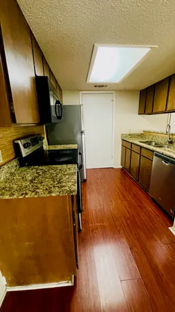 a view of a living room with furniture