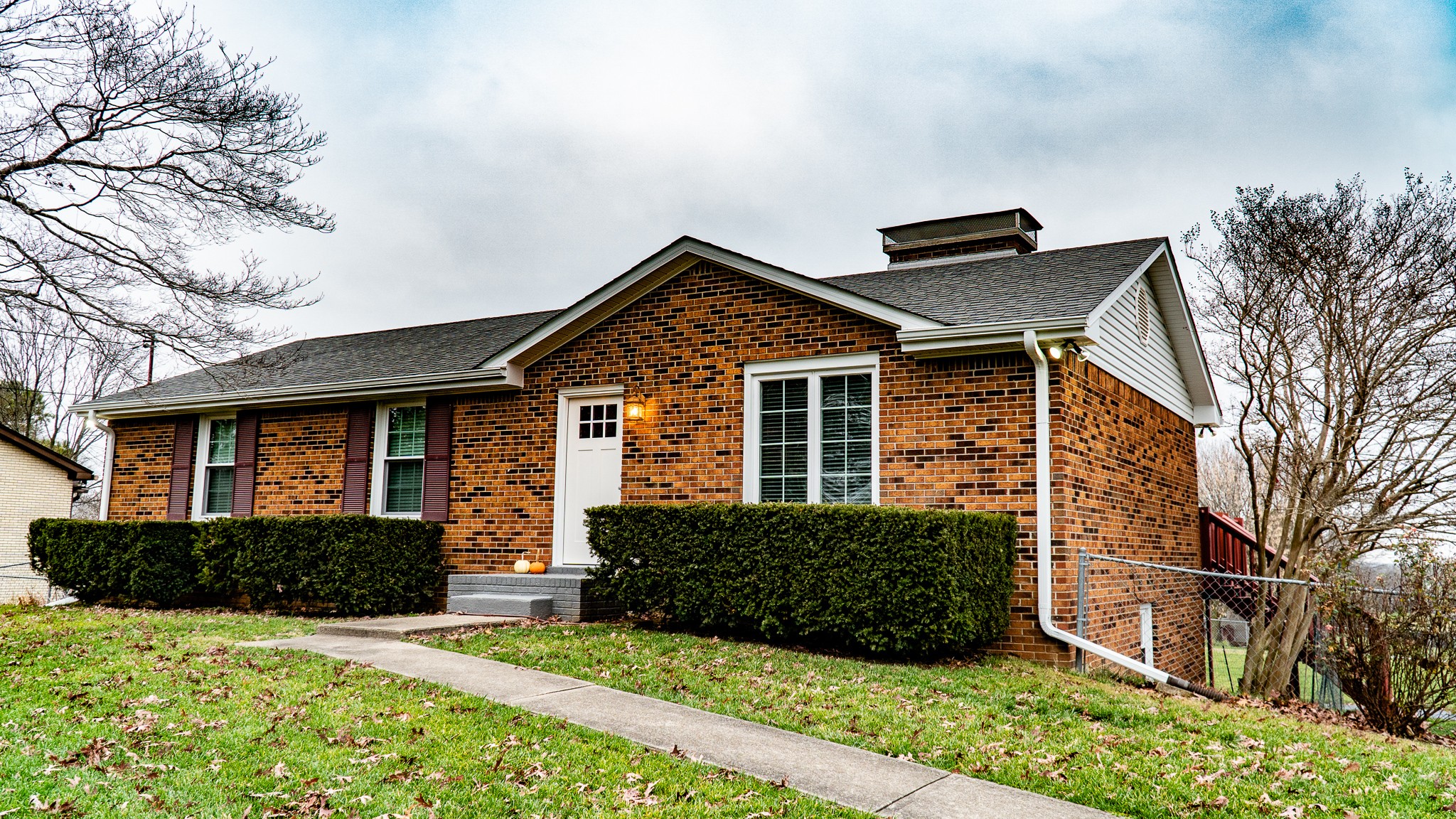 3411 Drake Road Adams, TN 37010 - Photo 1 of 27 a front view of a house with a yard