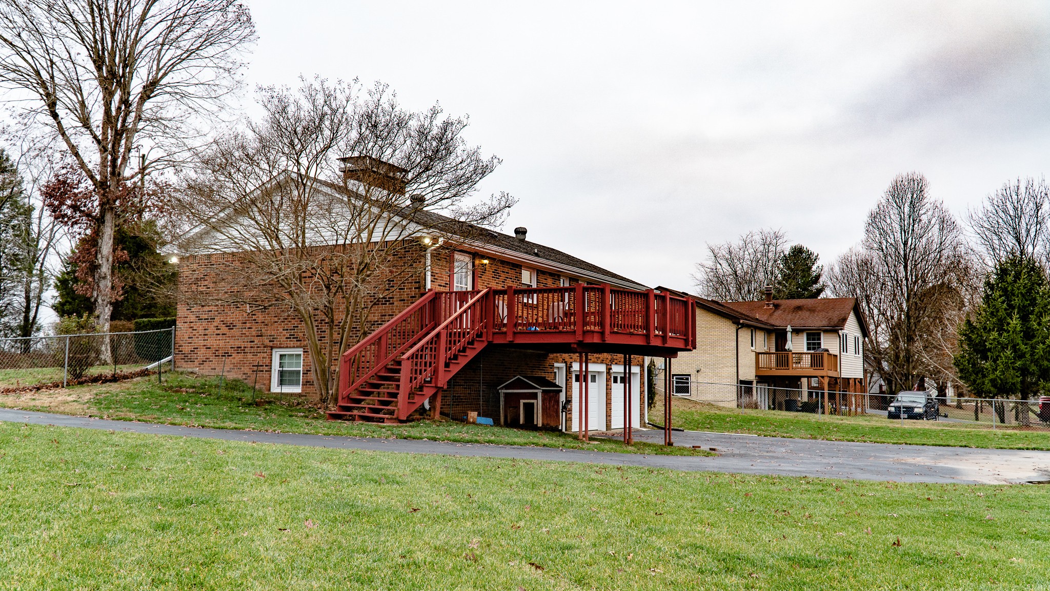 3411 Drake Road Adams, TN 37010 - Photo 5 of 27 a view of a big house with a big yard and large trees