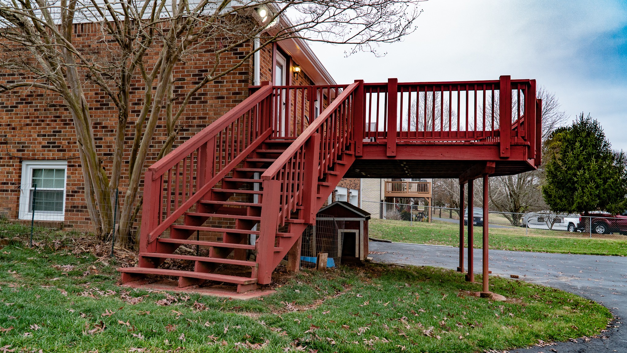 3411 Drake Road Adams, TN 37010 - Photo 6 of 27 a view of a backyard with a deck