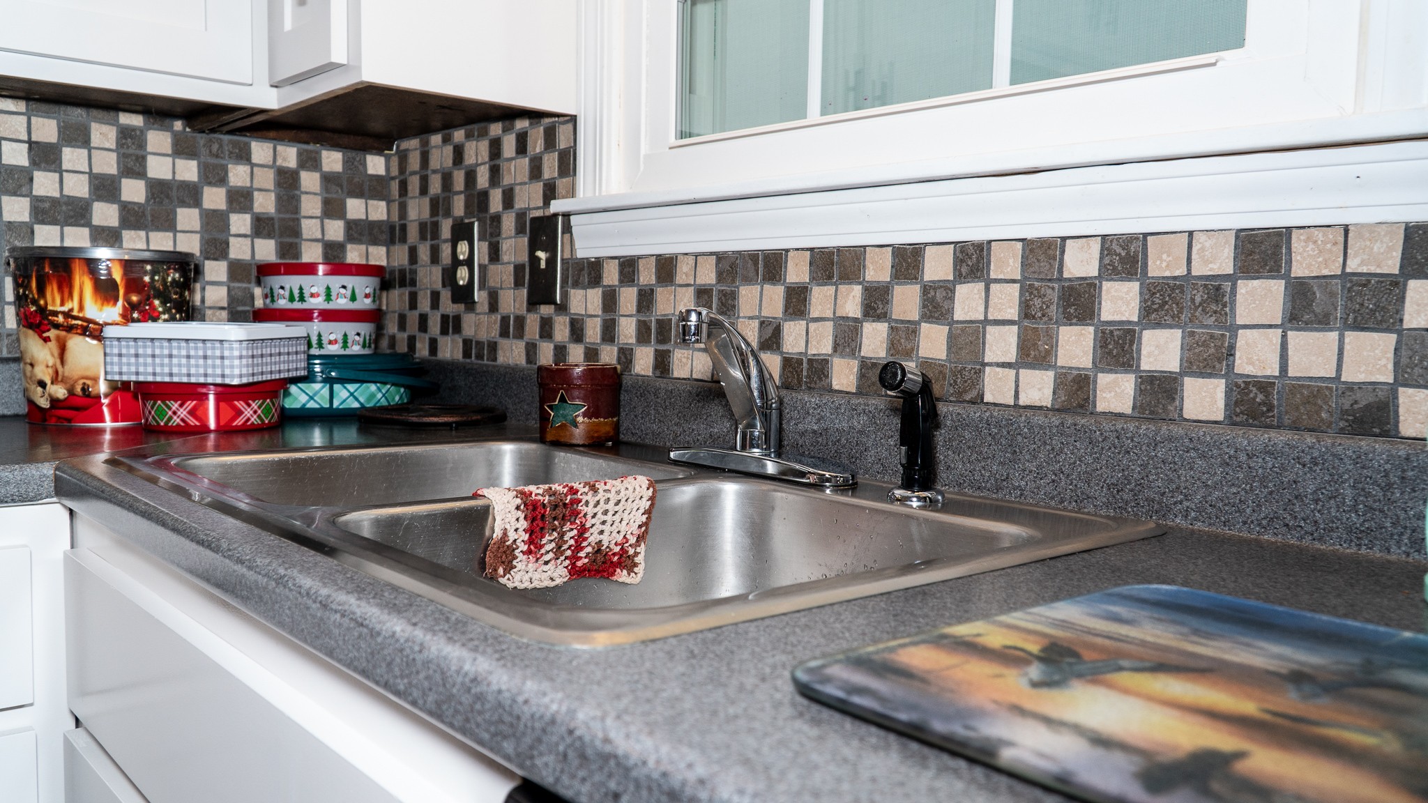 3411 Drake Road Adams, TN 37010 - Photo 10 of 27 a kitchen counter top with a sink and dining table