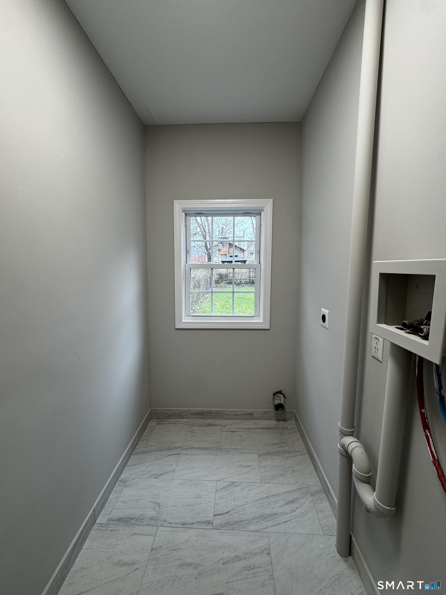 45-51 Cowles Street, Unit 45 Bridgeport, CT 06607 - Photo 27 of 33 Laundry room with washer dryer hookups conveniently located off the kitchen