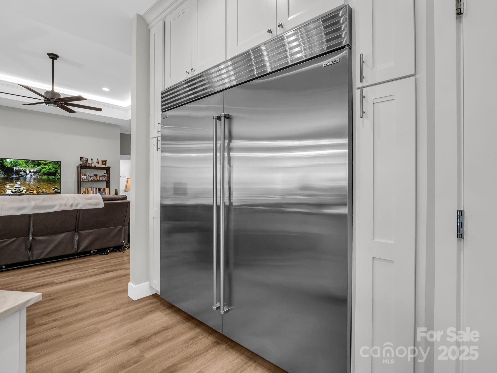 21 Walker Ridge Road Mill Spring, NC 28756 - Photo 13 of 48 a view of a hallway view with wooden floor and staircase
