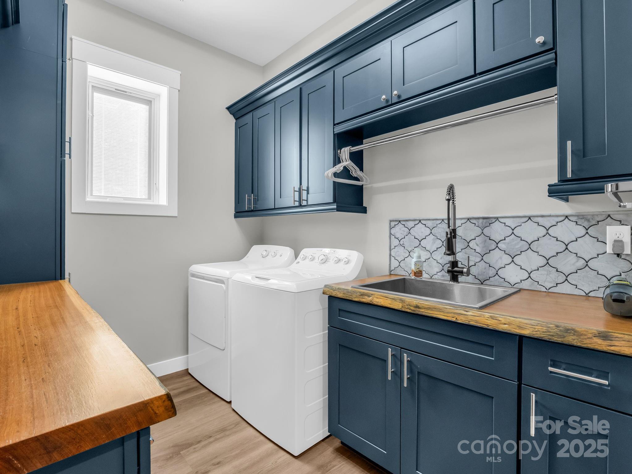21 Walker Ridge Road Mill Spring, NC 28756 - Photo 24 of 48 a utility room with cabinets