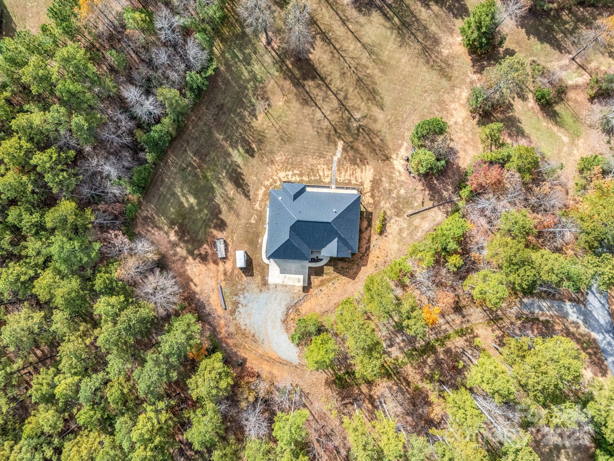 21 Walker Ridge Road Mill Spring, NC 28756 - Photo 45 of 48 a garden view with a tree