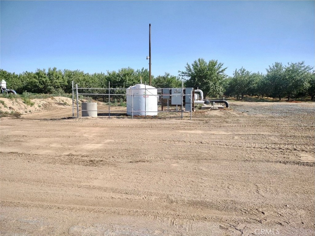 10351 Ave 112 Pixley, CA 93256 - Photo 12 of 14 a view of a lake with a big yard