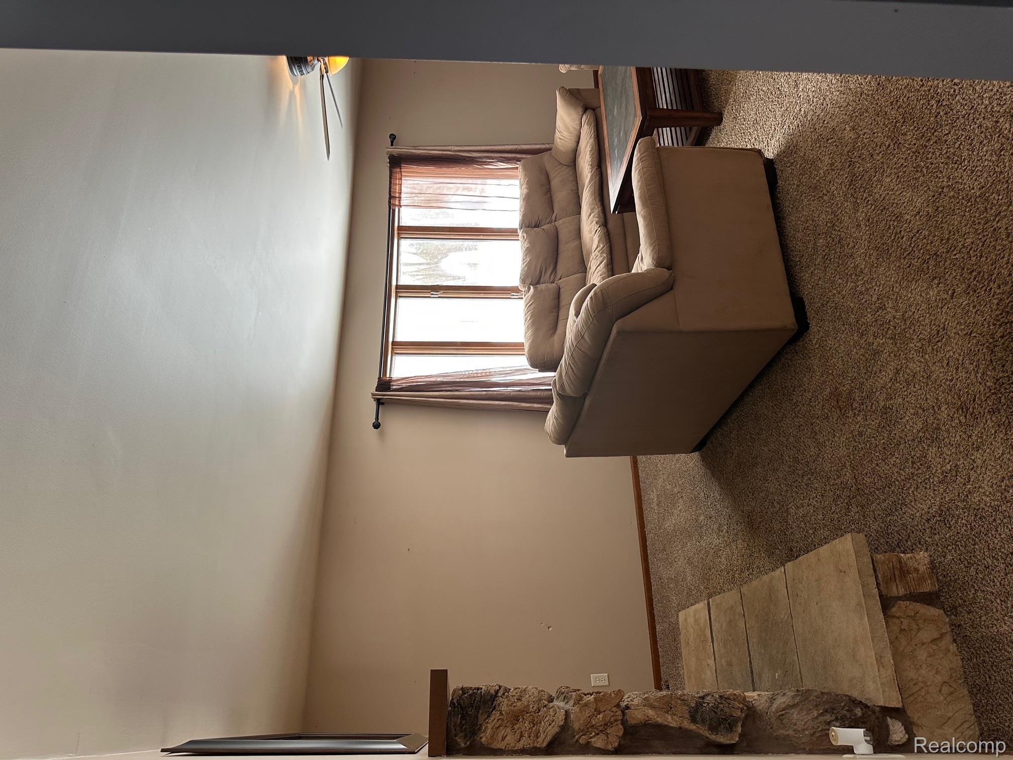 3803 Warner Road Cass City, MI 48726 - Photo 46 of 85 Carpeted living room with ceiling fan and baseboards