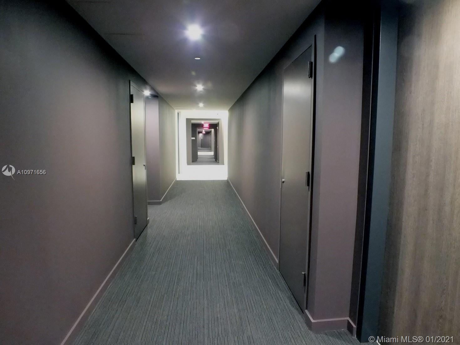 68 Southeast 6th Street, Unit 1010 Miami, FL 33131 - Photo 3 of 43 a view of hallway
