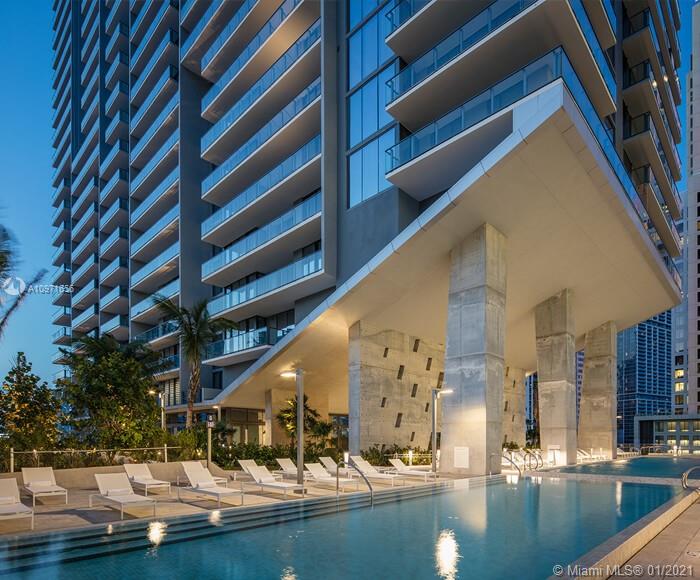 68 Southeast 6th Street, Unit 1010 Miami, FL 33131 - Photo 43 of 43 a view of swimming pool with outdoor seating