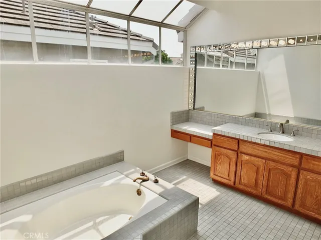 a view of a park with large trees